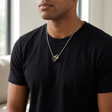 AI-generated styling illustration of the rainbow ring necklace worn with a black shirt