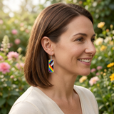 Person wearing rectangle earrings