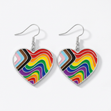 Wavy heart earrings on white