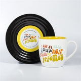 L&M MUG AND SAUCER-FRIENDS